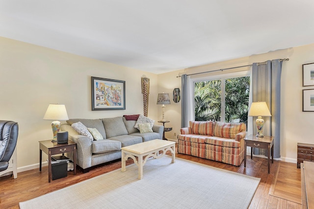 living room with light hardwood / wood-style flooring