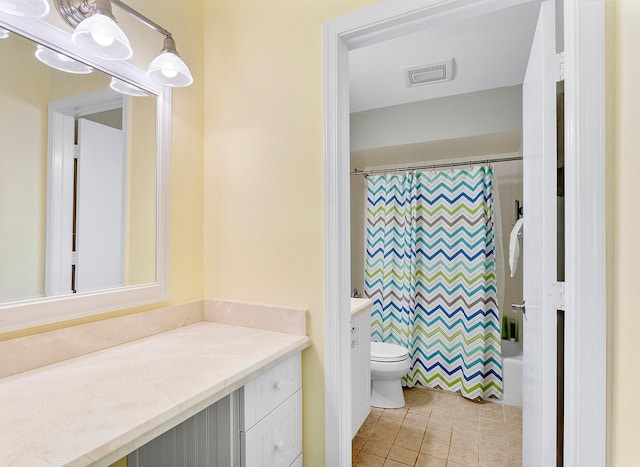 full bathroom with vanity, tile patterned floors, toilet, and shower / bathtub combination with curtain