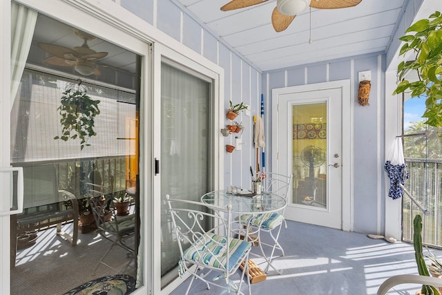 entrance to property featuring ceiling fan