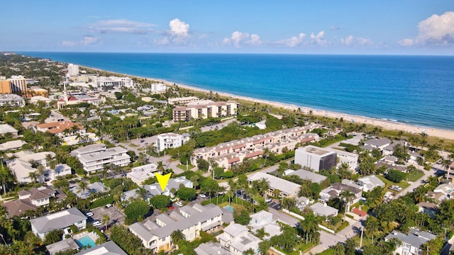 bird's eye view with a beach view and a water view