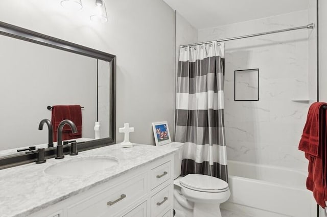 full bathroom with vanity, shower / tub combo, and toilet