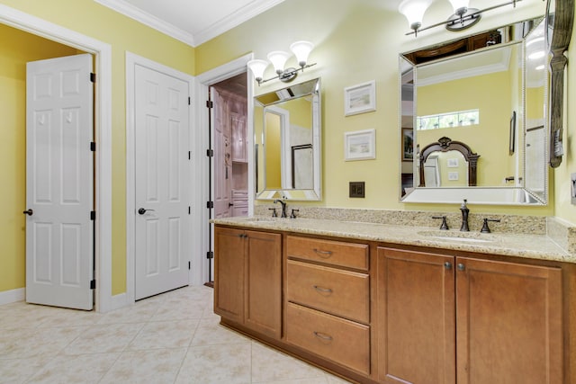 bathroom featuring vanity, tile patterned floors, and ornamental molding