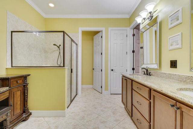 bathroom with ornamental molding, tile patterned flooring, and a shower with door