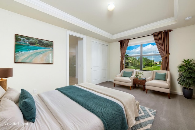 carpeted bedroom with ornamental molding, a raised ceiling, and baseboards