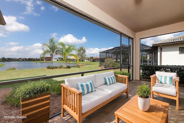 sunroom with a water view