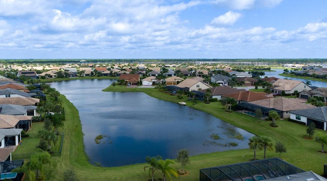 birds eye view of property featuring a residential view and a water view