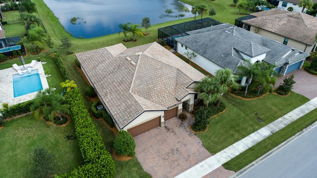 birds eye view of property featuring a water view