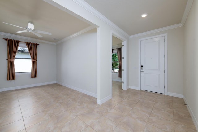 entrance foyer with ornamental molding, visible vents, ceiling fan, and baseboards