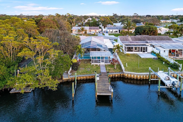 drone / aerial view with a water view