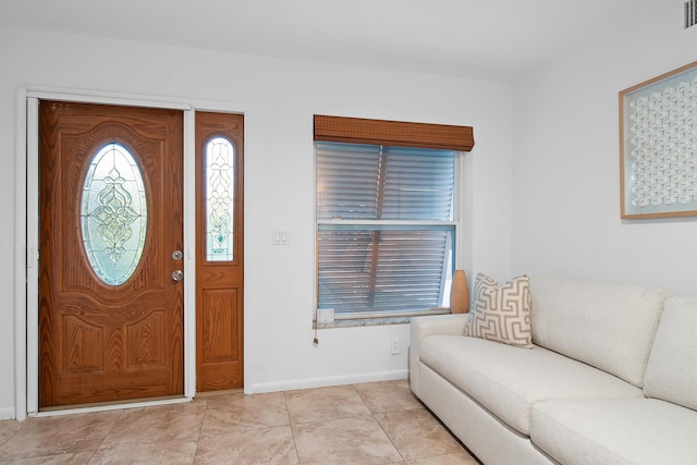 view of tiled foyer entrance