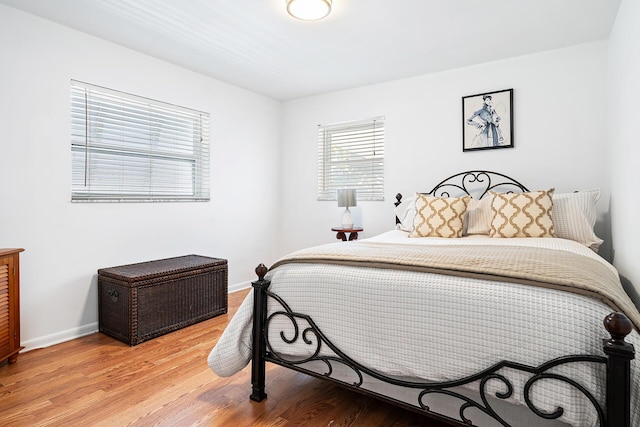 bedroom featuring hardwood / wood-style floors