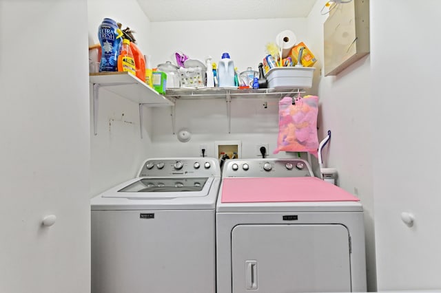 laundry room with laundry area and separate washer and dryer