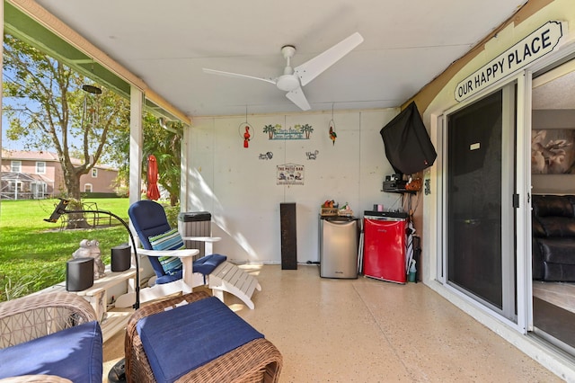 sunroom with a ceiling fan