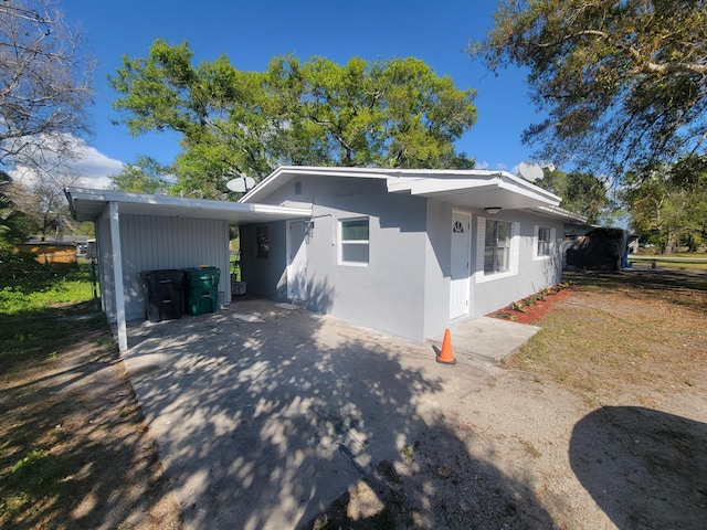 view of front of house featuring a carport