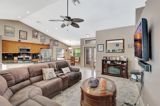 1075 E Lancewood Pl, Delray Beach, FL 33445 - living area featuring a ceiling fan, high vaulted ceiling, recessed lighting, and light marble finish flooring