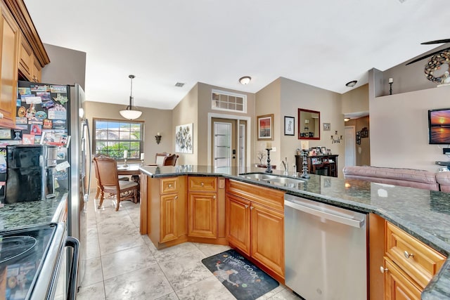 1075 E Lancewood Pl, Delray Beach, FL 33445 - kitchen featuring stainless steel dishwasher, electric range oven, a sink, pendant lighting, and dark stone countertops