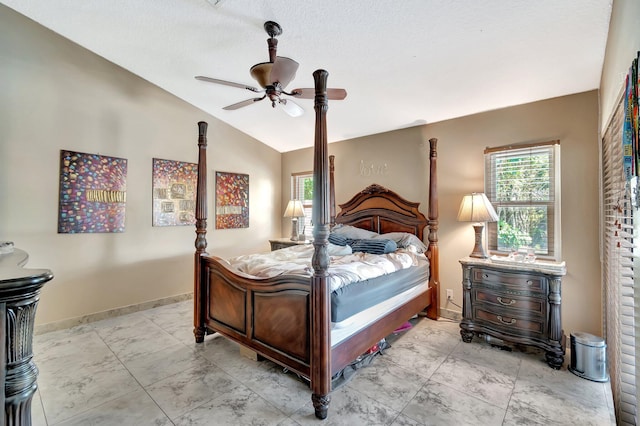 1075 E Lancewood Pl, Delray Beach, FL 33445 - bedroom with lofted ceiling, a ceiling fan, and baseboards