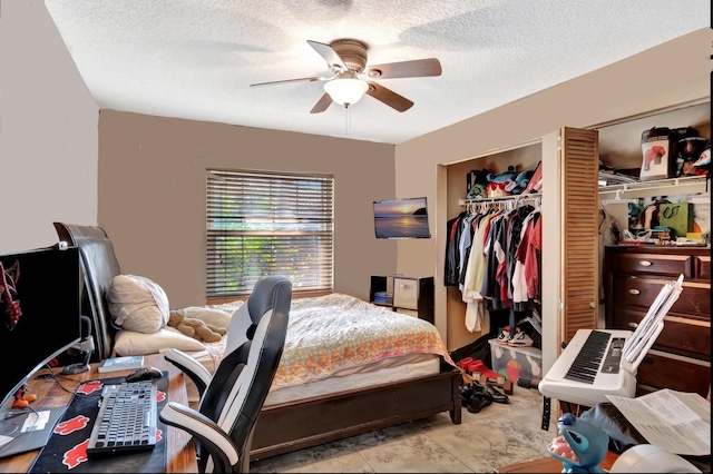 1075 E Lancewood Pl, Delray Beach, FL 33445 - bedroom with a textured ceiling, ceiling fan, and multiple closets