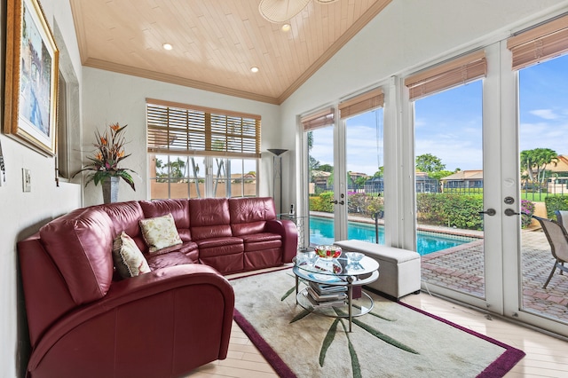6525 Via Benita, Boca Raton, FL 33433 - living room with light wood finished floors, lofted ceiling, wood ceiling, french doors, and crown molding