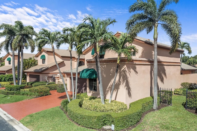 6525 Via Benita, Boca Raton, FL 33433 - view of property with a garage