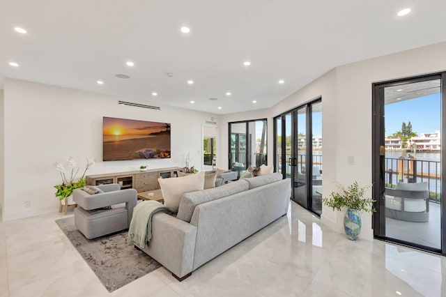800 Andrews Ave Unit 9, Delray Beach, FL 33483 - living area featuring recessed lighting, light marble finish floors, french doors, and baseboards