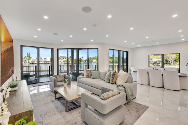 800 Andrews Ave Unit 9, Delray Beach, FL 33483 - living room with a water view and recessed lighting