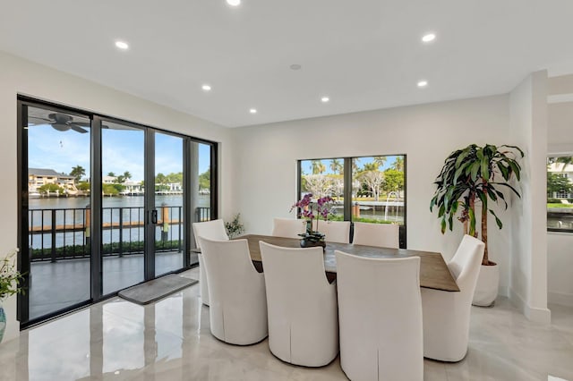 800 Andrews Ave Unit 9, Delray Beach, FL 33483 - dining room with a water view, baseboards, french doors, and recessed lighting