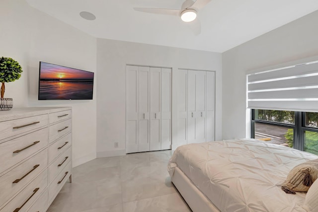 800 Andrews Ave Unit 9, Delray Beach, FL 33483 - bedroom featuring marble finish floor, a ceiling fan, and multiple closets