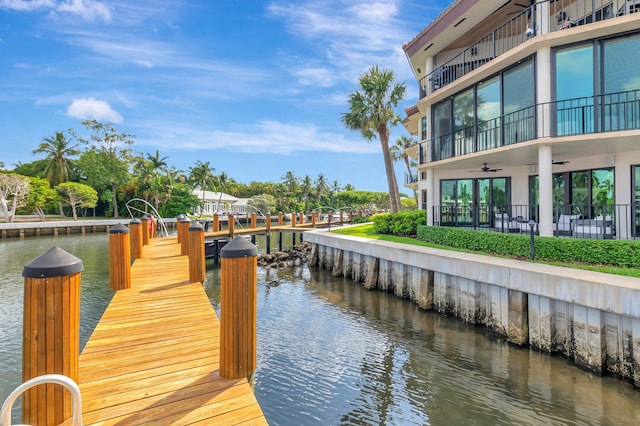 800 Andrews Ave Unit 9, Delray Beach, FL 33483 - dock area featuring a water view and a balcony