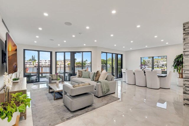 800 Andrews Ave Unit 9, Delray Beach, FL 33483 - living area with recessed lighting, light marble finish floors, and a water view