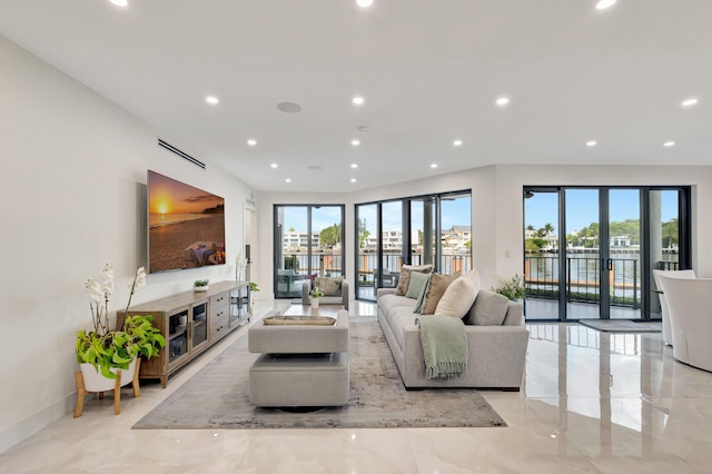 800 Andrews Ave Unit 9, Delray Beach, FL 33483 - living area featuring recessed lighting and baseboards