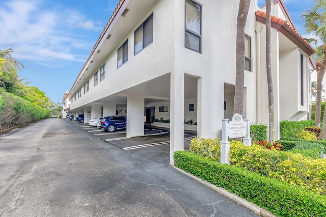 800 Andrews Ave Unit 9, Delray Beach, FL 33483 - view of building exterior with covered parking