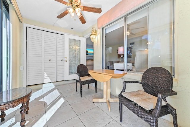 interior space featuring ceiling fan