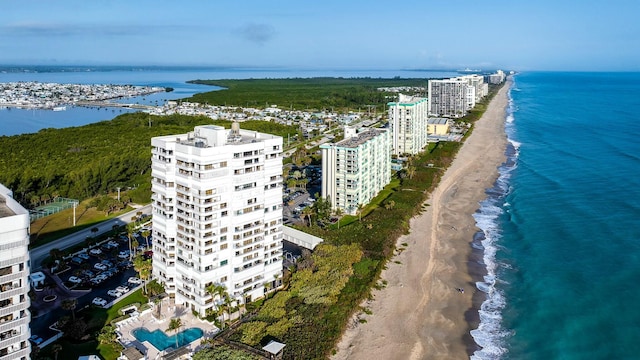 aerial view with a water view and a view of the beach