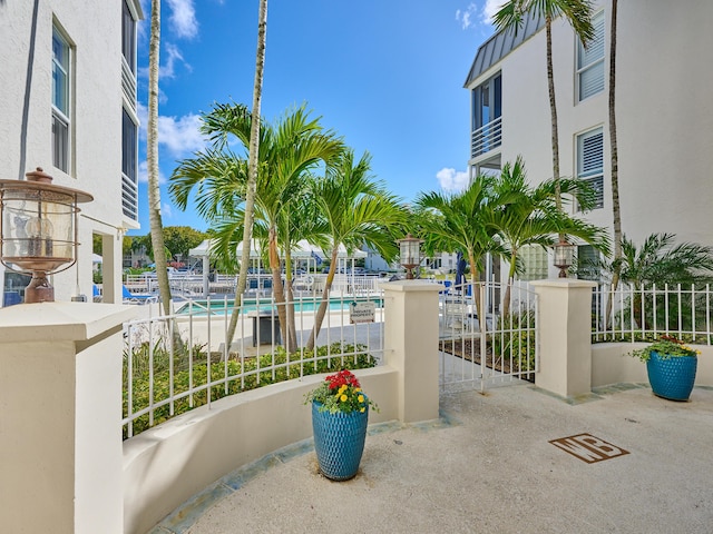 view of patio / terrace featuring a community pool