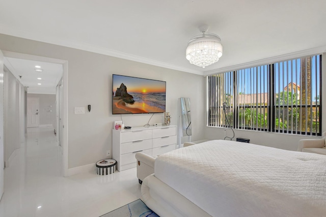 tiled bedroom featuring ornamental molding and an inviting chandelier