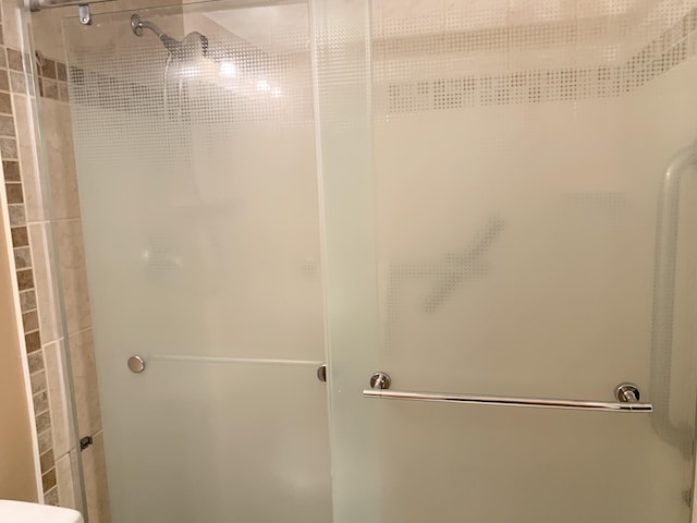 bathroom featuring walk in shower