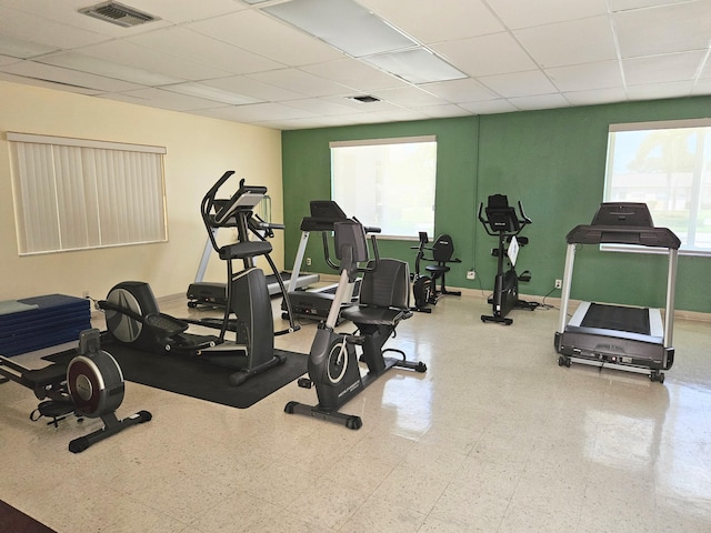 workout area with a drop ceiling