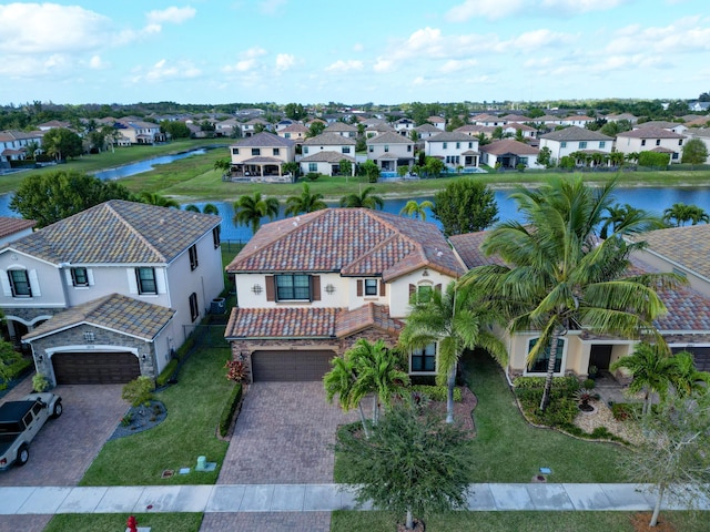 drone / aerial view with a water view