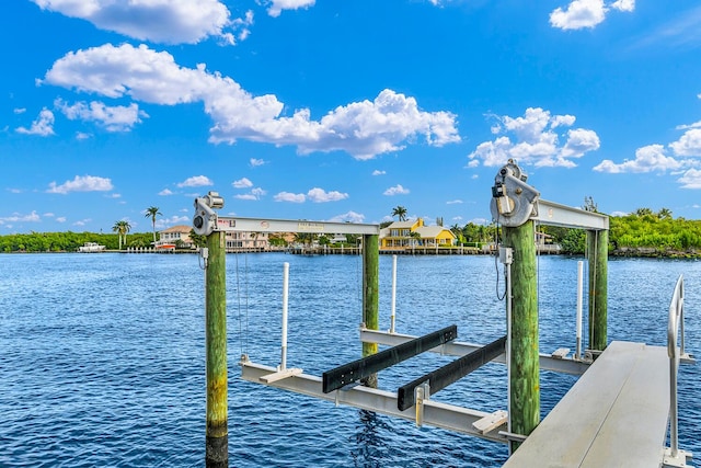 655 Castilla Ln, Boynton Beach, FL 33435 - dock with boat lift and a water view