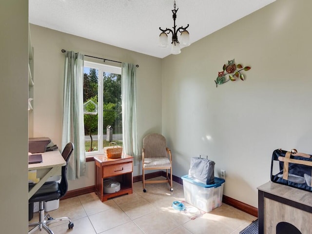 interior space with a notable chandelier and light tile patterned floors