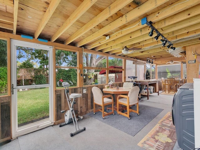 sunroom / solarium featuring washer / clothes dryer