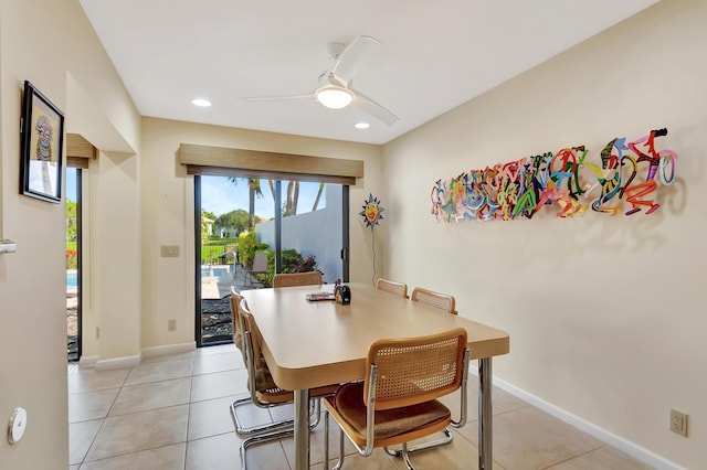 dining area featuring light tile patterned floors and ceiling fan