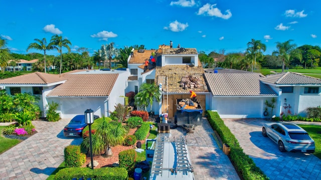 mediterranean / spanish-style house featuring a garage