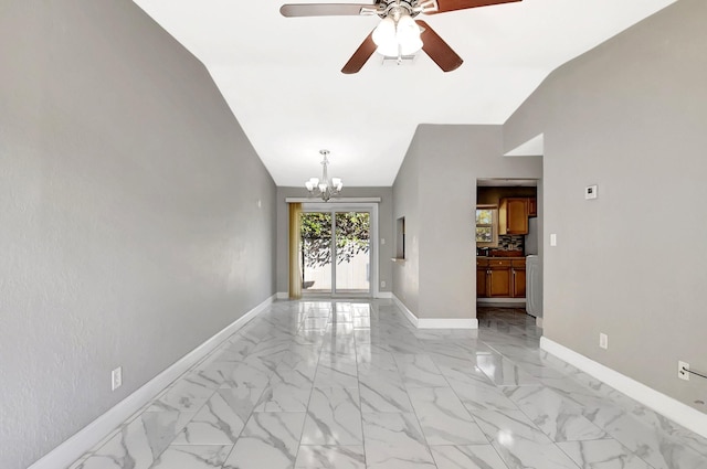 interior space featuring lofted ceiling and ceiling fan with notable chandelier