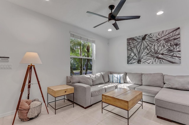 living room featuring light tile patterned floors and ceiling fan