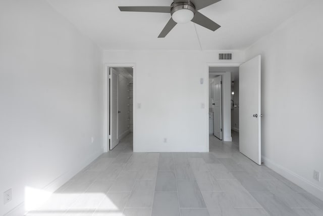 unfurnished room featuring ceiling fan