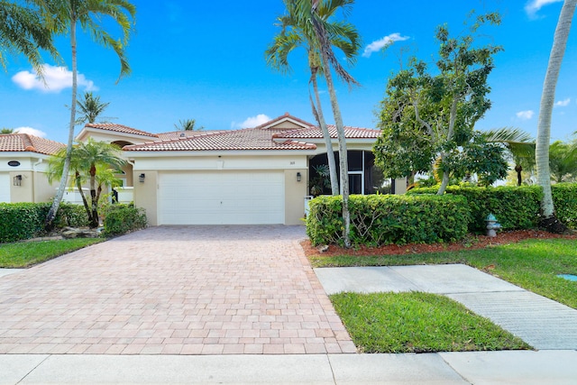 view of front of property featuring a garage