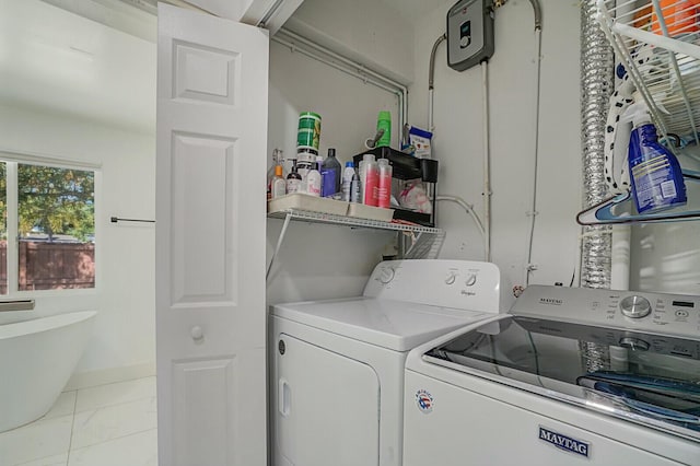 laundry room with independent washer and dryer