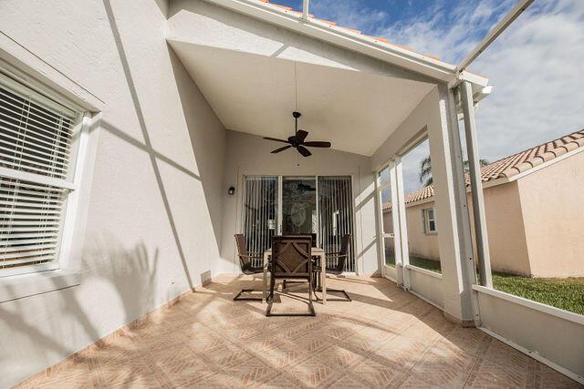 view of patio / terrace featuring ceiling fan